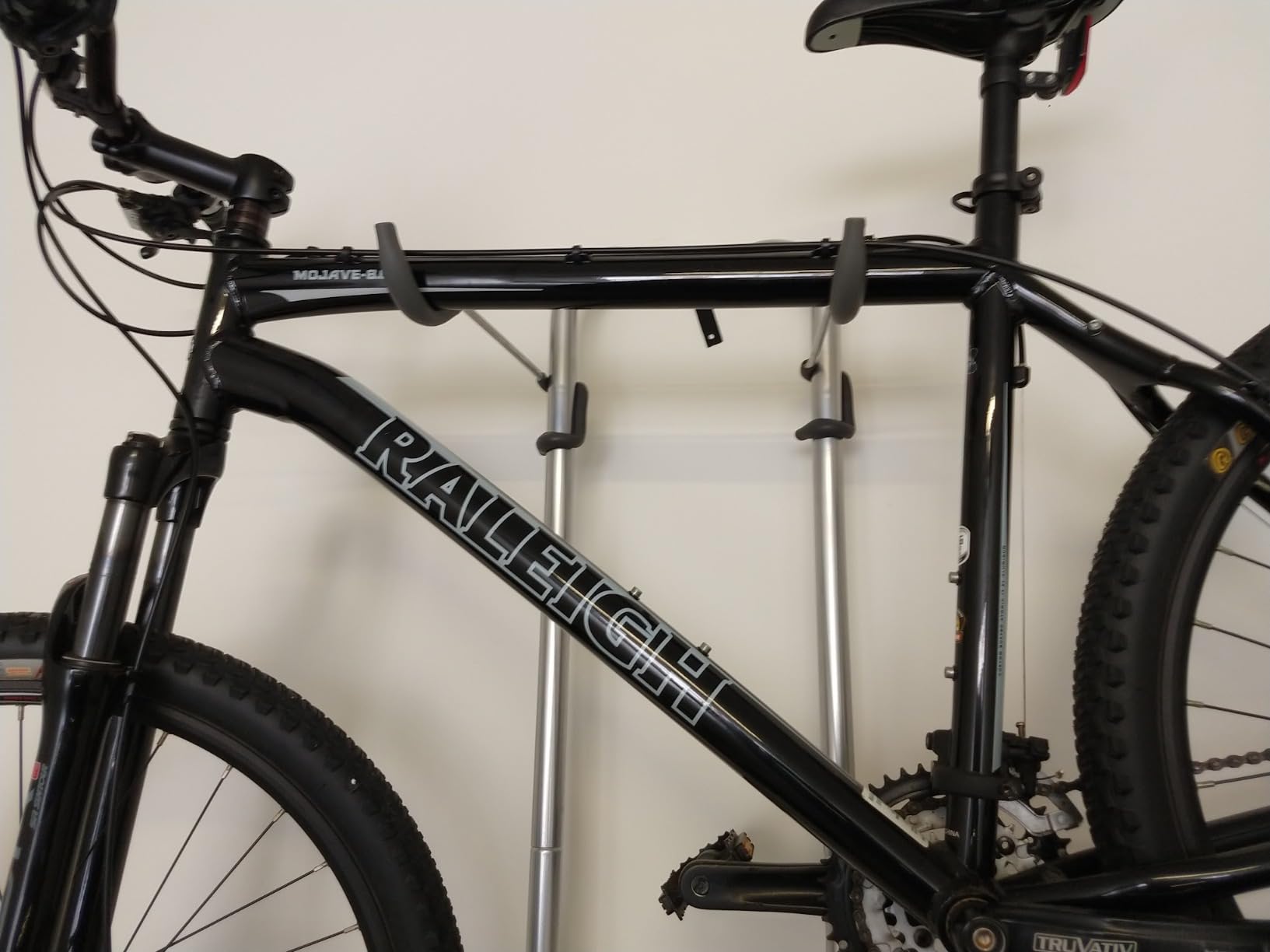 Delta Cycle Michelangelo 2 Bike Storage Rack - Gravity Fully Adjustable Bike Storage Garage For Road, MTB, and Hybrid Bicycles - Vertical Bike Rack Holds Up To 80 lbs customer photo 1