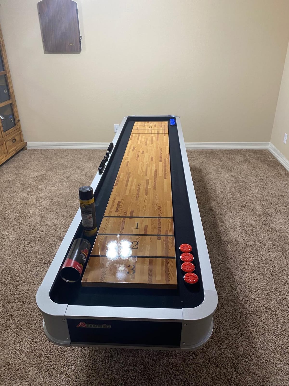 Atomic 9’ LED Shuffleboard Tables with Poly-Coated Playing Surface for Smooth, Fast Puck Action and Pedestal Legs with Levelers for Optimum Stability and Level Play customer photo 1