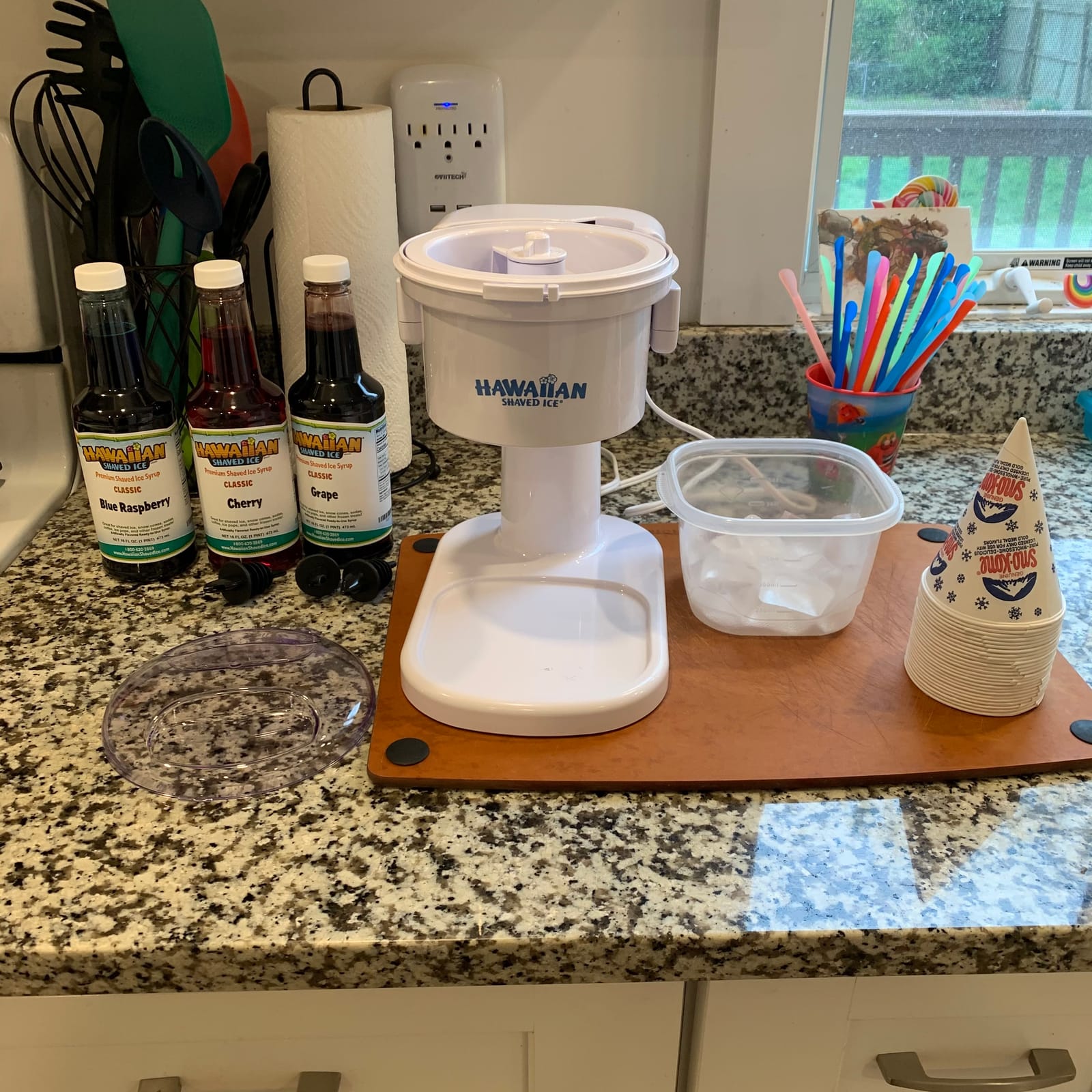 Hawaiian Shaved Ice S700 Kid-Friendly Snow Cone Machine Kit with 3-16oz. Syrup Flavors: Cherry, Grape, and Blue Raspberry, Plus 25 Snow Cone Cups, 25 Spoon Straws, and 3 Black Bottle Pourers customer photo 2
