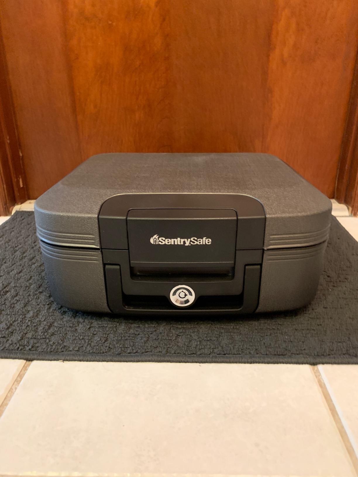 SentrySafe Charcoal Gray Fireproof and Waterproof Safe Box with Key Lock, Portable Chest for Money, Passport, 0.28 Cubic Feet, 6.6 x 15.4 x 14.3 Inches, CHW20221 customer photo 1