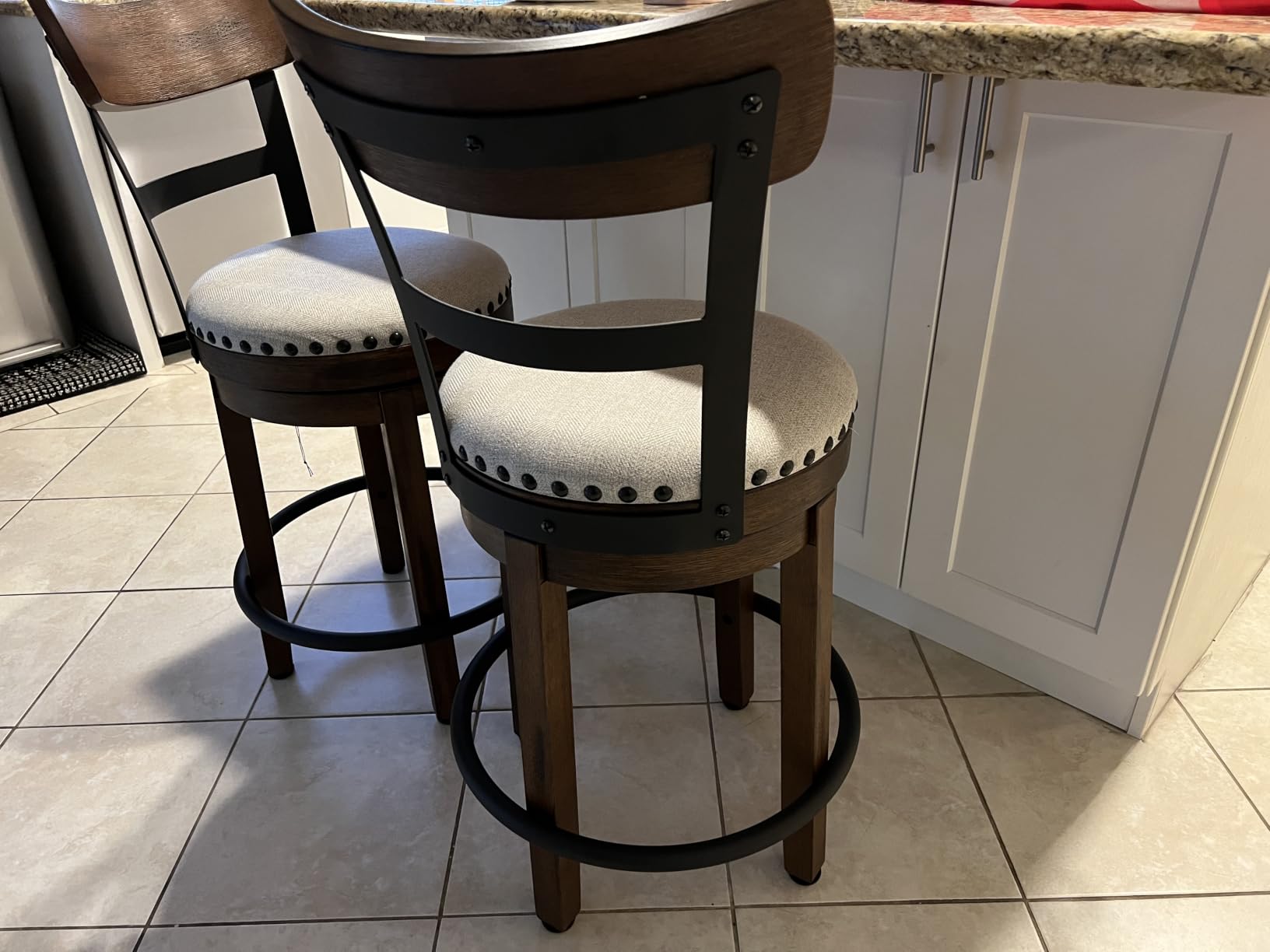Signature Design by Ashley Valebeck Counter Height Bar Stool, Brown | Rustic-industrial wood and metal stool, Cushioned comfort, Tailored nailhead trim, Smooth 360-degree swivel customer photo 1